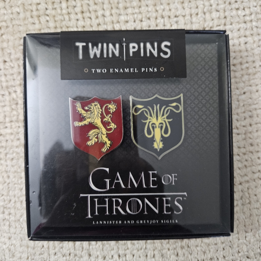 Game of Thrones Twin pins. Lannister and Greyjoy Sigils.